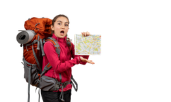 Woman with backpack and map exploring Nepal's mountains for trekking.