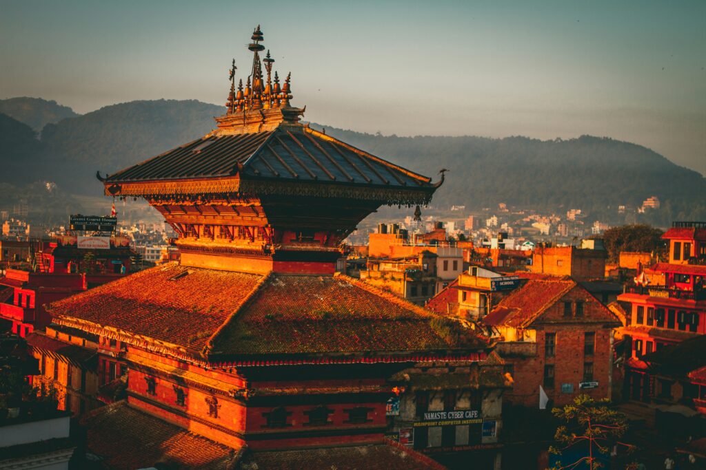 Nepal temple with traditional architecture during sunset.